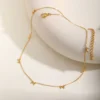 Collier nœud à breloques